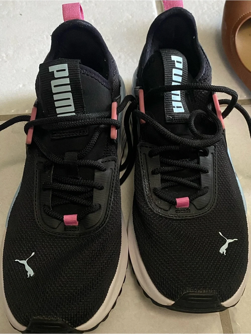 Puma black sneakers